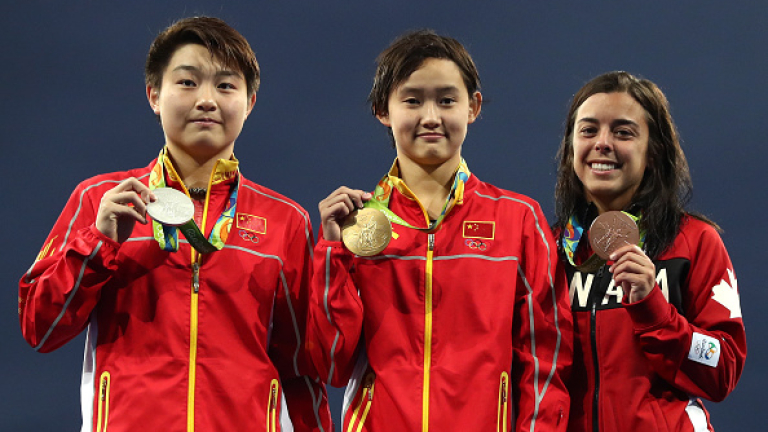 Китайска ученичка носи олимпийска слава на Китай