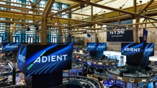 Производителят на тапицерии за автомобилни седалки Adient обяви че ще