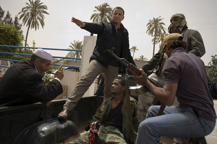 Тунис плаши Кадафи с ООН
