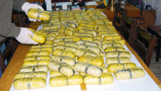 Извадиха 27 кг хероин от тенекии с маслини