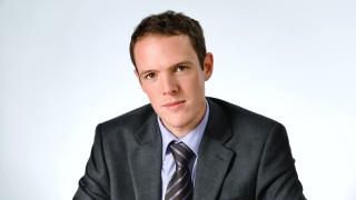 Джоузеф Бел експерт по разплащания от Охеra Consulting LLP пред