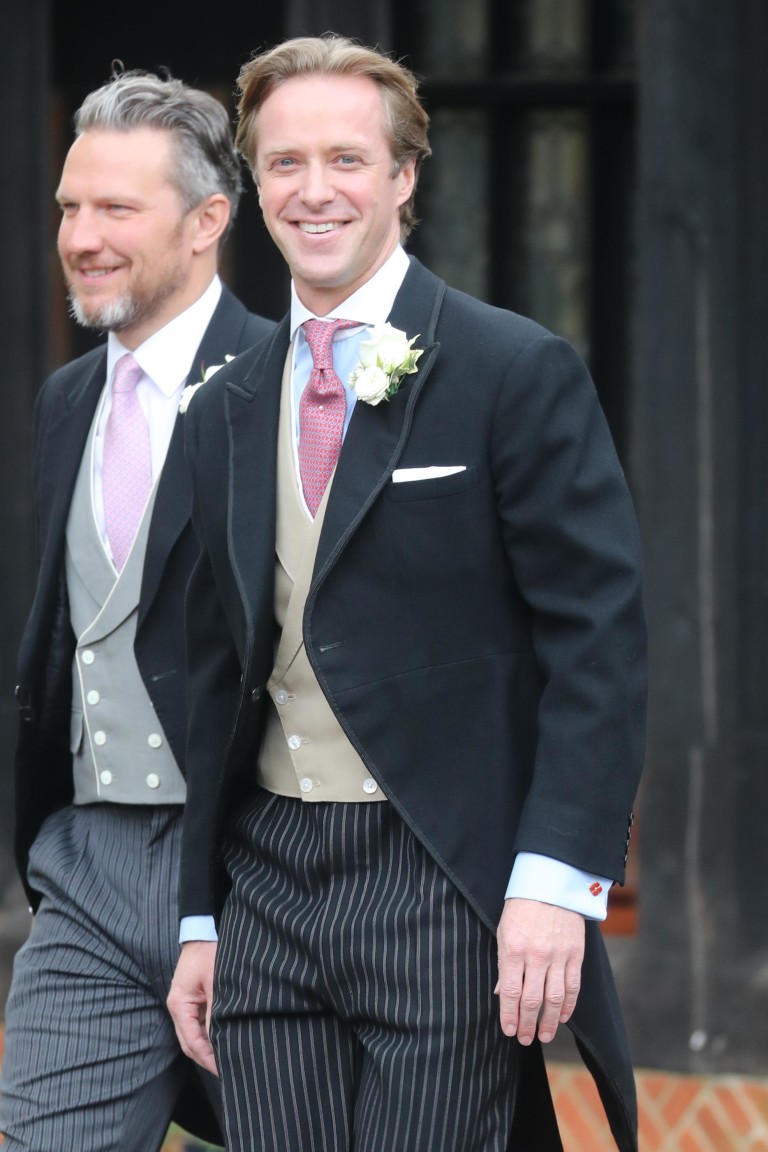 Томас (вдясно) на сватбения си ден