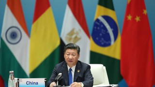 Китай скастри Тръмп, призова за борба с протекционизма и климатичните промени 