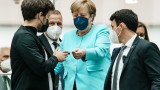 Меркел настоява за по-бързи действия за климата, докато жертвите от наводненията нарастват