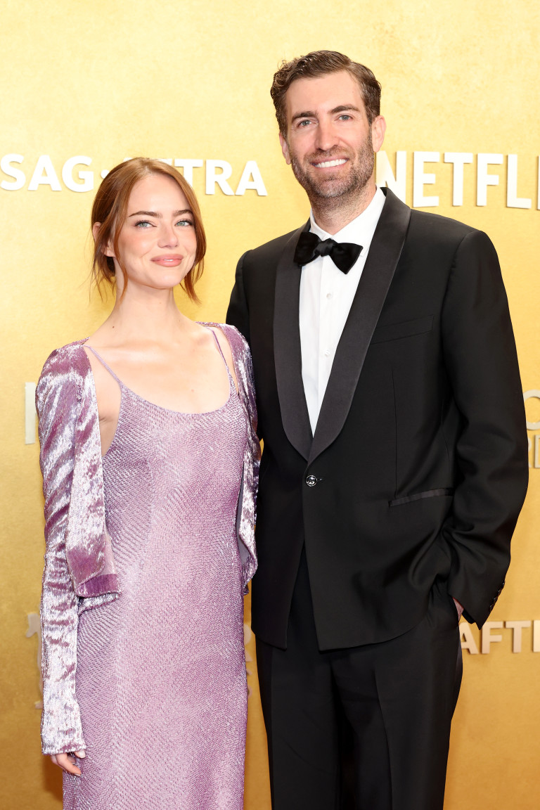 Стоун със съпруга си