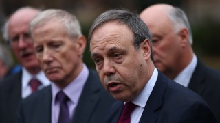 Северноирландската партия DUP чиято подкрепа е ключова за възможността на