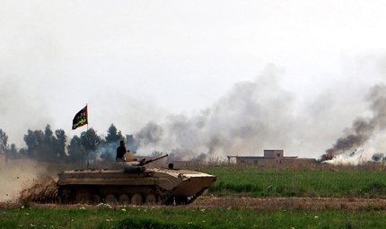 Снайперисти и бомби спират настъплението на иракските сили в Тикрит