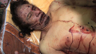 Застреляли Кадафи от упор
