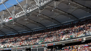 Защитаващият титлата си Фред Кърли САЩ и олимпийският шампион от