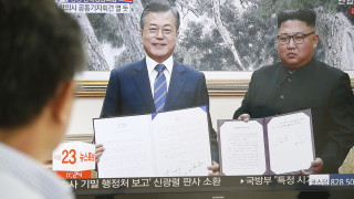 Лидерът на Северна Корея Ким Чен ун и президентът на