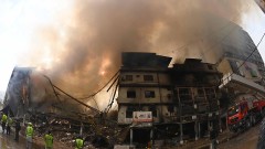 Жертвите в пожара в мол в Пакистан вече са 14