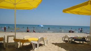 Чадърът на плажа с касова бележка от 21 юли