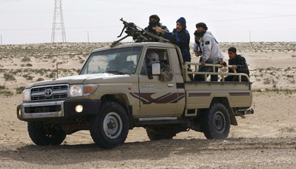Бунтовниците обграждат родния град на Кадафи