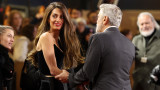 Амал Клуни и Джордж Клуни на премиерата на новия му филм The Boys in the Boat