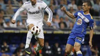 Реал се измъчи, но изпревари Барса