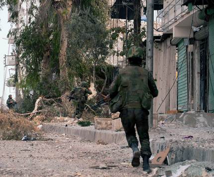 Боеве до военна казарма в сирийския град Алепо