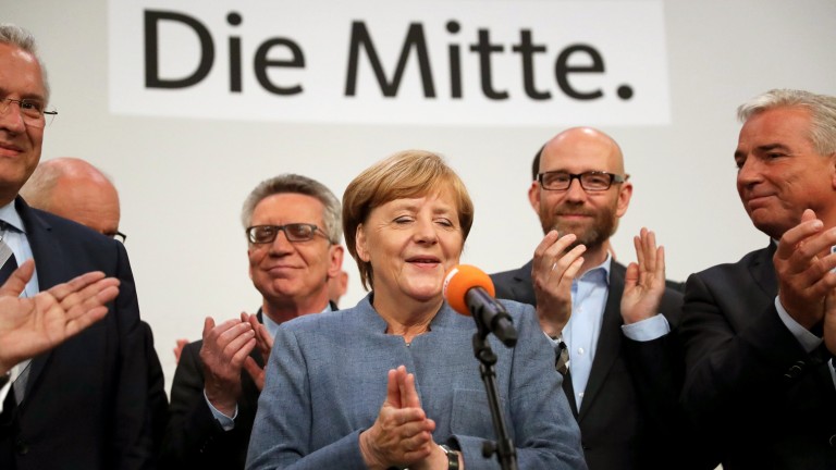 Консервативният блок на Меркел печели изборите, според официални неокончателни резултати 