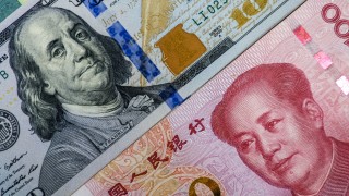 Китайският юан достигна нови рекордно ниски нива спрямо растящия щатски