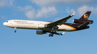 Карго самолет McDonnell Douglas MD 11 на компанията UPS изпълняващ полет