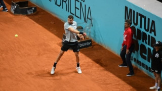 Григор Димитров загуби две места и дели с Джон Иснър