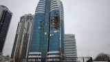 Дрон порази небостъргач в чеченската столица Грозни