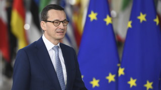 Полският премиер спечели вота на доверие 