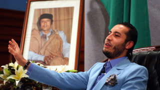 Синът на Кадафи убил либийски треньор?