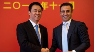 Възход и падение: Кой е председателят на Evergrande Хуeй Ка Йен и как смята да спаси империята си?