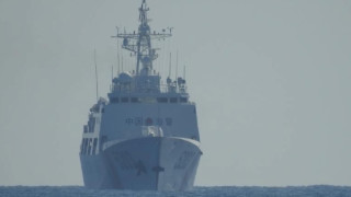 Китайските сили проследили и прогонили американски военен кораб който навлязъл