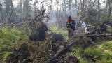  Горски пожари бушуват в Сибир, гъст пушек покри Якутск и затвори летището 